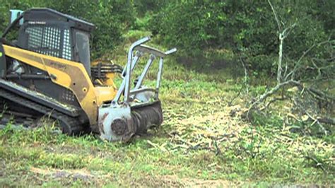 can a skid steer clear land|brush clearing attachment for tractor.